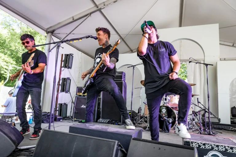 Guitarists and vocalist performing — Punchline 13, Vans Warped Tour Montreal 2026