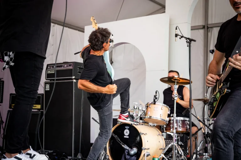 Singer and drummer on stage — Punchline 13, Vans Warped Tour Montreal 2026