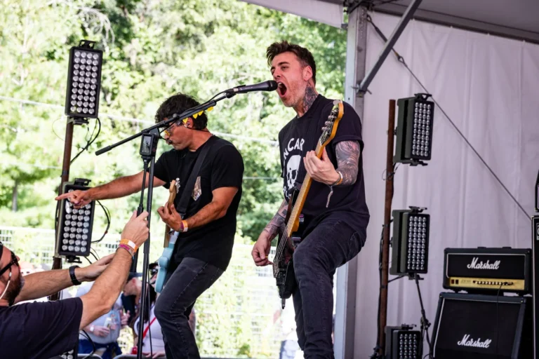 Guitarists performing together — Punchline 13, Vans Warped Tour Montreal 2026