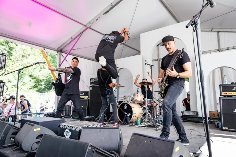 Wide view of the band performing — Punchline 13, Vans Warped Tour Montreal 2026