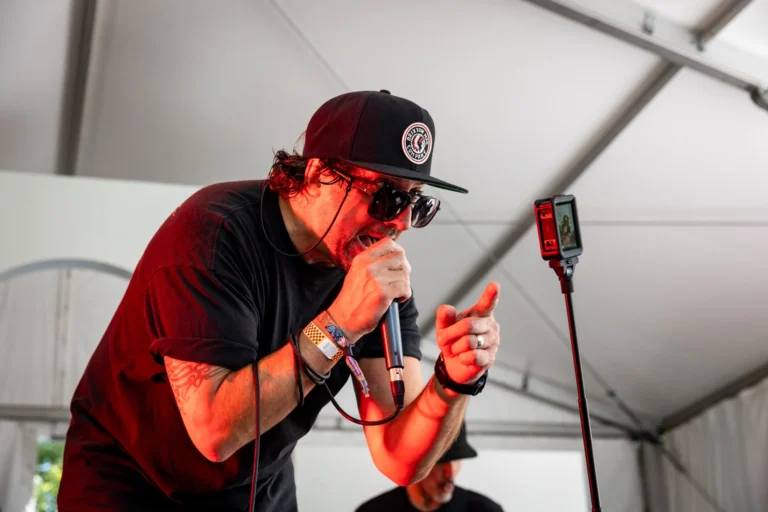 Vocalist singing into a microphone — Punchline 13, Vans Warped Tour Montreal 2026