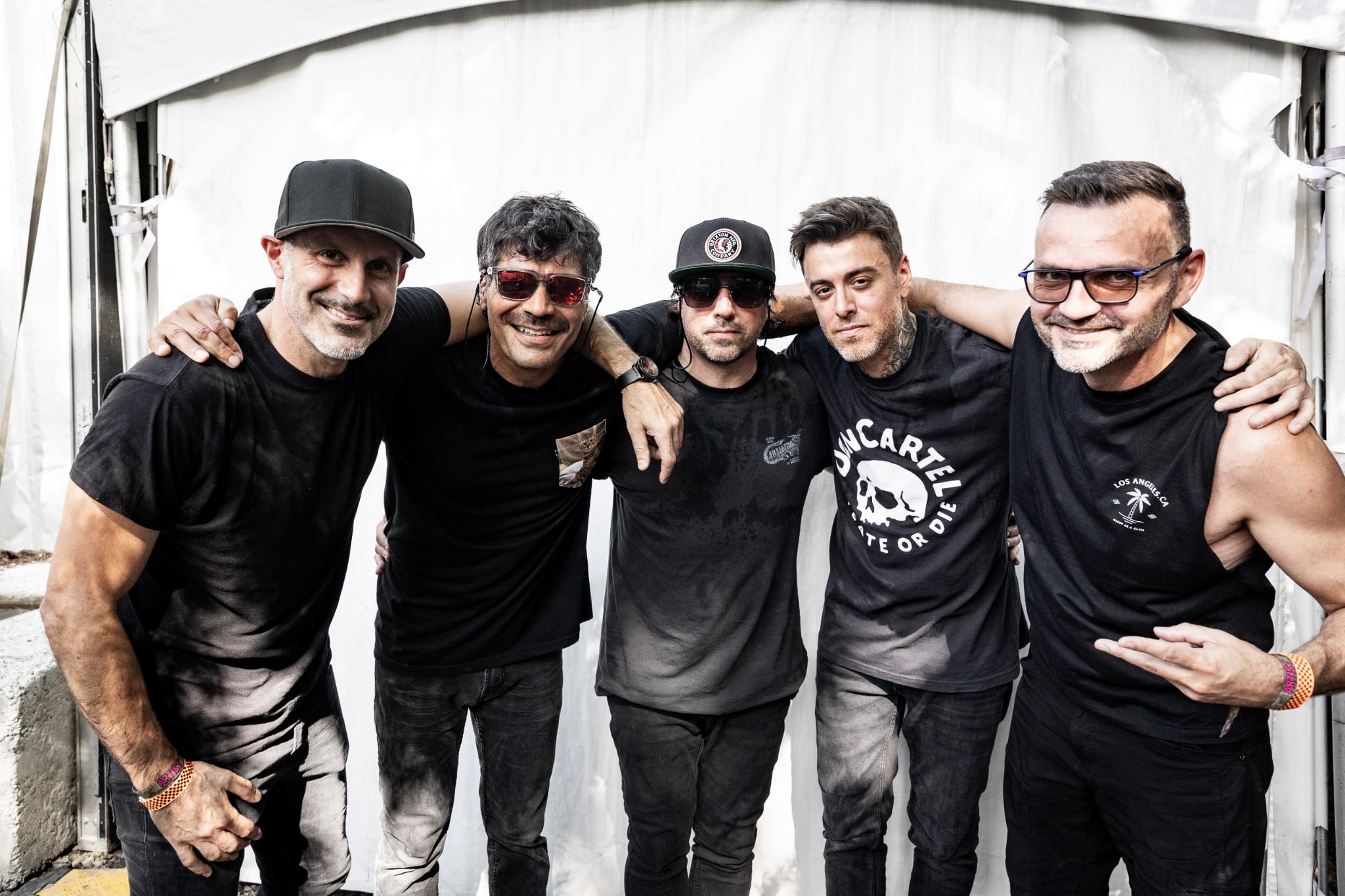 The five members of Punchline 13 together backstage